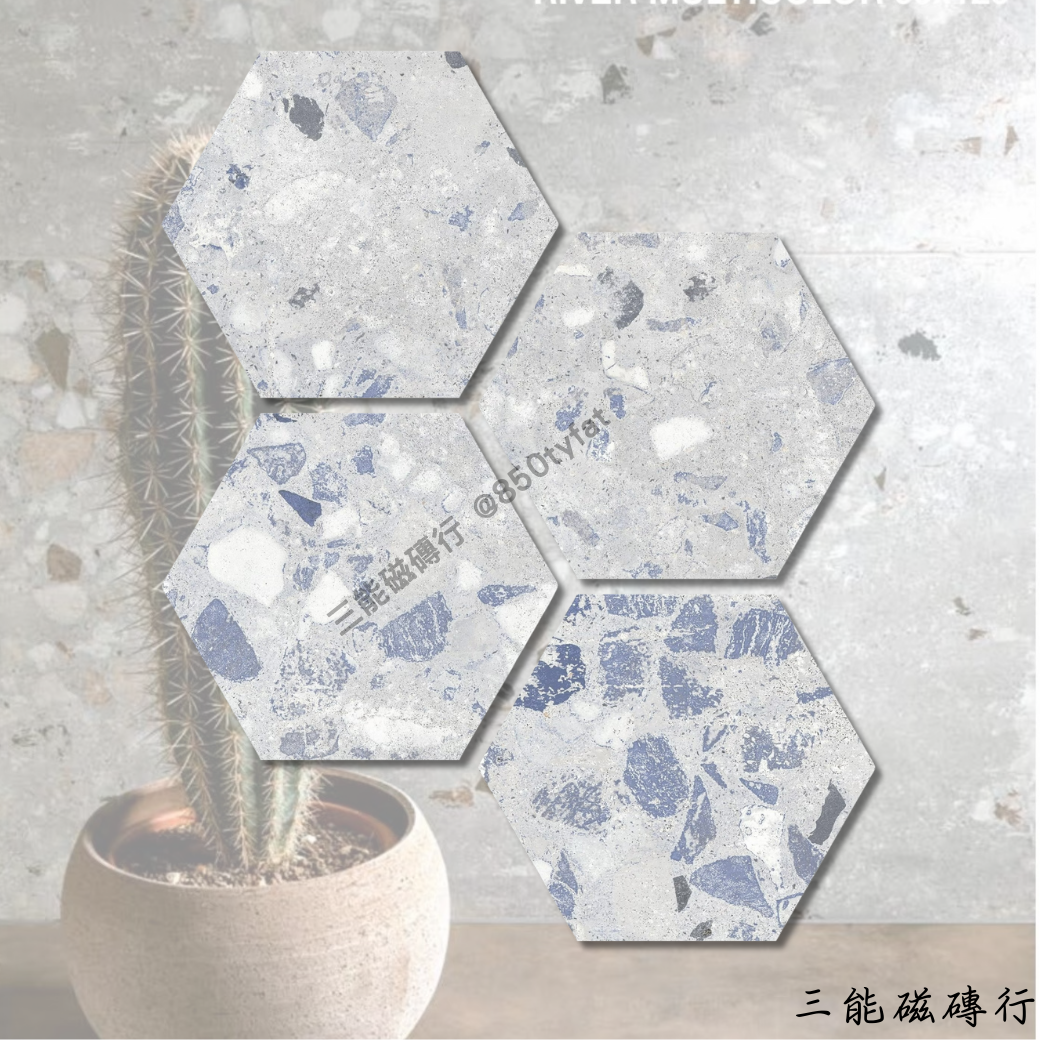 六角形瓷磚，純白色基底，帶有細緻的顆粒與水泥質感，營造簡約自然的氛圍，適用於現代風格的牆面與地坪鋪