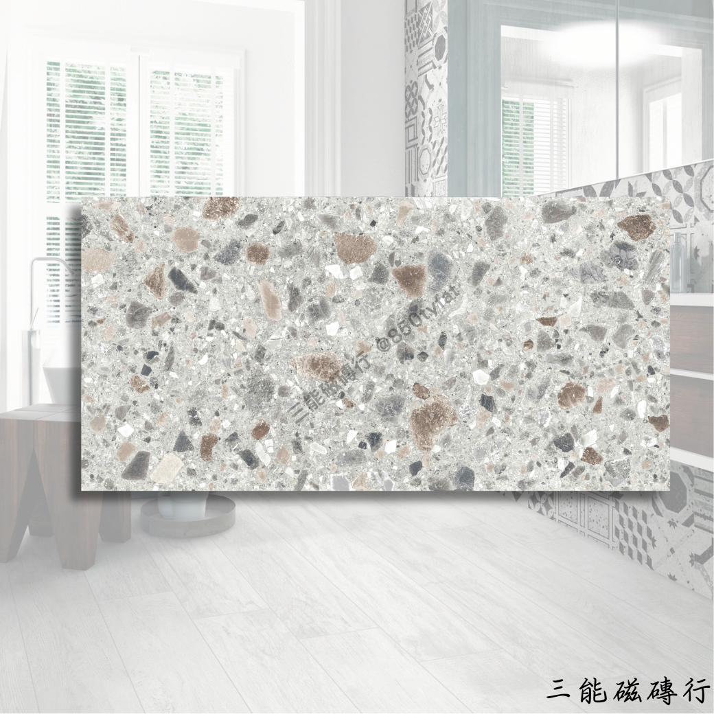 布雷西亞深灰色磁磚，60x120cm，深沉灰底佐以晶礦般碎石點綴，展現都會質感。