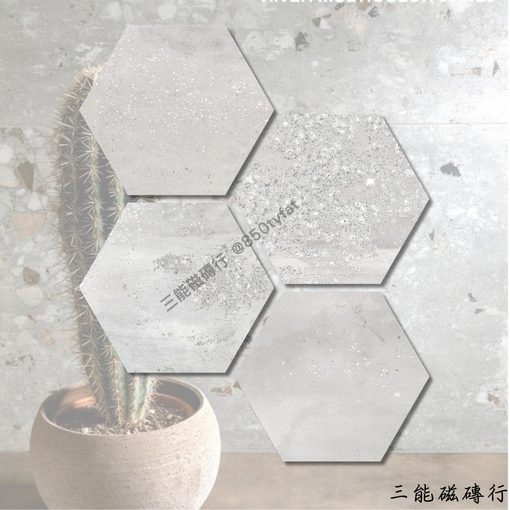 六角形瓷磚，純白色基底，帶有細緻的顆粒與水泥質感，營造簡約自然的氛圍，適用於現代風格的牆面與地坪鋪