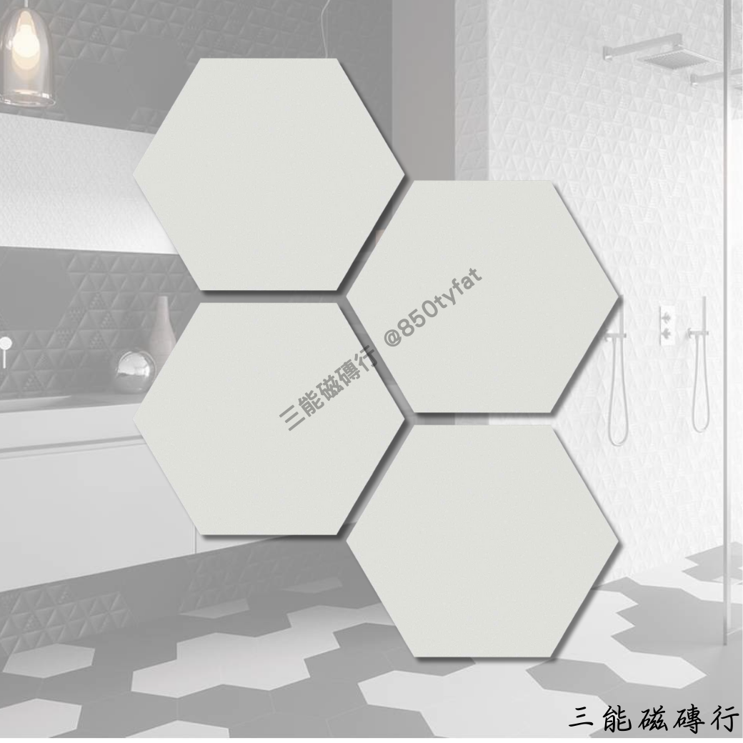 六角形瓷磚，純白色水泥質感，帶有細膩的啞光紋理，適合現代簡約與北歐風裝潢設計。