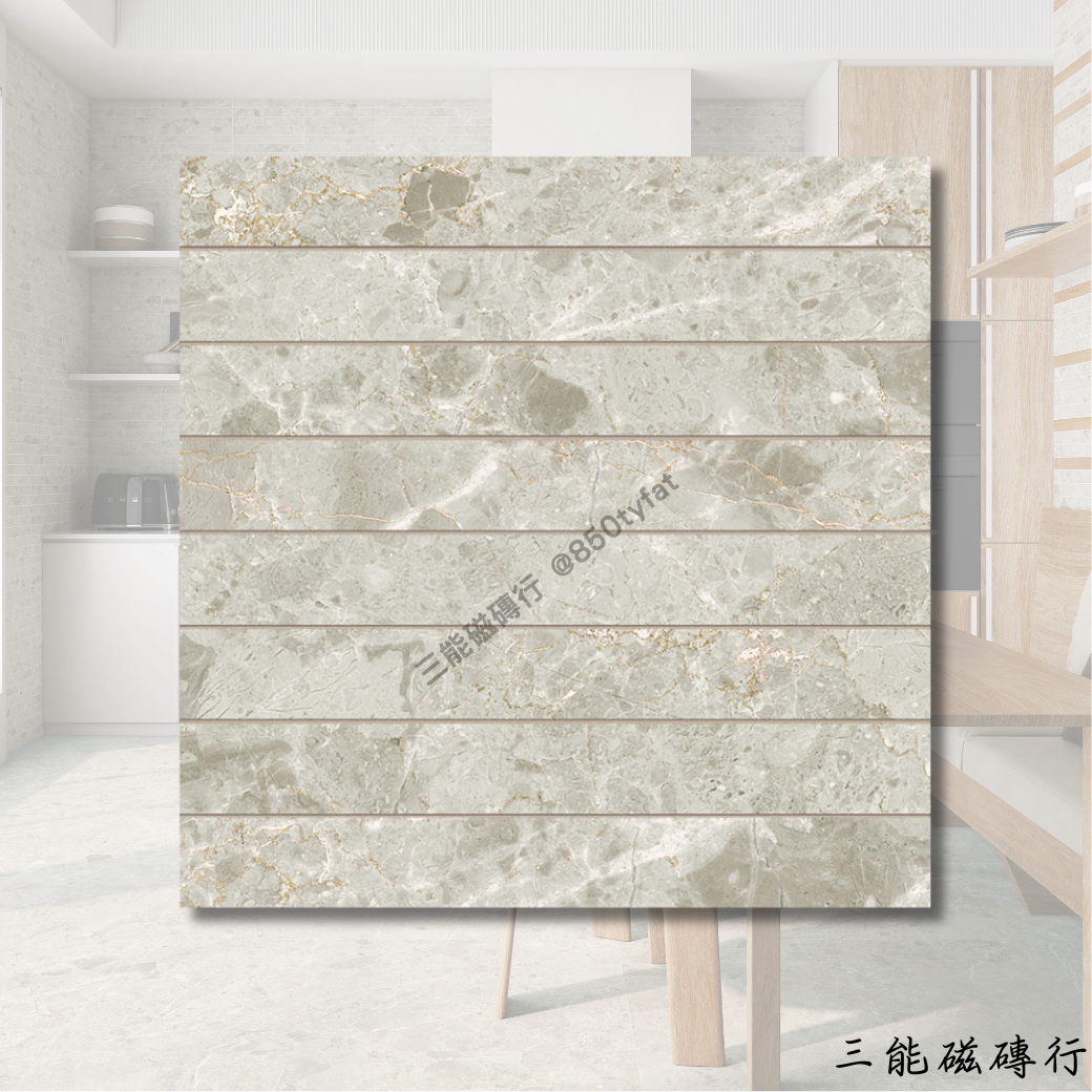 淺米灰大理石長條磚，表面帶有細緻玉石紋理與金色礦脈，適用於高質感牆面裝飾